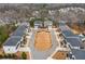 Aerial view of a community with houses and green spaces at 1433 Sugarmill Oaks Ave, Atlanta, GA 30316