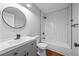 Modern bathroom with subway tile and gray vanity at 452 Lindsay Nw St, Atlanta, GA 30314