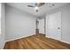 Bright bedroom featuring wood-look floors and ceiling fan at 452 Lindsay Nw St, Atlanta, GA 30314