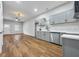 Modern gray kitchen with stainless steel appliances and quartz countertops at 452 Lindsay Nw St, Atlanta, GA 30314
