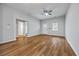 Spacious living room featuring hardwood floors and ceiling fan at 452 Lindsay Nw St, Atlanta, GA 30314