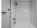 Clean subway tile shower with black fixtures at 452 Lindsay Nw St, Atlanta, GA 30314