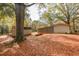 Spacious backyard featuring a storage shed and a separate covered shelter, ideal for outdoor storage at 105 Tranquillity Dr, Villa Rica, GA 30180