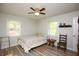 Bright bedroom with ceiling fan and hardwood floors at 105 Tranquillity Dr, Villa Rica, GA 30180