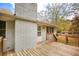 Wooden deck overlooks backyard with wooded area at 105 Tranquillity Dr, Villa Rica, GA 30180