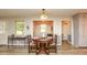 Inviting dining area featuring a round table and chairs with bright light fixtures above at 105 Tranquillity Dr, Villa Rica, GA 30180