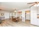 Charming dining area with wood floors, a round table, and natural light at 105 Tranquillity Dr, Villa Rica, GA 30180