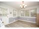 Bright dining room with hardwood floors and window seating at 105 Tranquillity Dr, Villa Rica, GA 30180