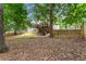 Spacious backyard with deck and wooden privacy fence at 113 Willow Hill Ln, Stockbridge, GA 30281