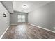 Finished basement with wood-look tile floors at 113 Willow Hill Ln, Stockbridge, GA 30281