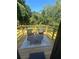 Private deck with seating area, offering peaceful views of the backyard at 1705 Nw Mary George Ave, Atlanta, GA 30318