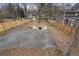 Large backyard with fire pit and paved patio at 1752 Ridgeway Nw Ave, Atlanta, GA 30318