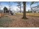 Spacious backyard with large tree and wooden fence at 1752 Ridgeway Nw Ave, Atlanta, GA 30318