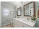 Updated bathroom with double vanity and a walk-in shower at 1752 Ridgeway Nw Ave, Atlanta, GA 30318