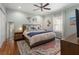 Spacious bedroom with hardwood floors and a ceiling fan at 1752 Ridgeway Nw Ave, Atlanta, GA 30318