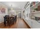 Elegant dining room with built-in shelving and hardwood floors at 1752 Ridgeway Nw Ave, Atlanta, GA 30318