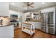 Modern kitchen with stainless steel appliances and an island at 1752 Ridgeway Nw Ave, Atlanta, GA 30318