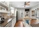 Bright kitchen featuring granite countertops and hardwood floors at 1752 Ridgeway Nw Ave, Atlanta, GA 30318