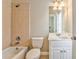 Bathroom with tub, toilet and vanity at 6037 Addington Nw Dr, Acworth, GA 30101