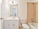 Clean bathroom, shower/tub combo, and white vanity at 6037 Addington Nw Dr, Acworth, GA 30101