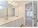 Double vanity bathroom with a view into a bedroom at 6037 Addington Nw Dr, Acworth, GA 30101