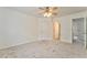 Spacious bedroom with ceiling fan and carpet at 6037 Addington Nw Dr, Acworth, GA 30101