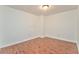 Empty bedroom featuring hardwood floors at 6037 Addington Nw Dr, Acworth, GA 30101