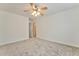 Spacious bedroom with ceiling fan and neutral carpeting at 6037 Addington Nw Dr, Acworth, GA 30101