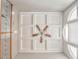 High ceiling with coffered design and a ceiling fan at 6037 Addington Nw Dr, Acworth, GA 30101