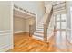 Grand two-story entry with hardwood floors and elegant staircase at 6037 Addington Nw Dr, Acworth, GA 30101