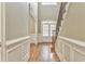 Elegant entryway with hardwood floors, and a grand staircase at 6037 Addington Nw Dr, Acworth, GA 30101