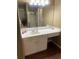 Bathroom with a vanity and a large mirror at 103 Live Oak Ct, Dallas, GA 30157