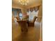 Bright dining room with a glass-top table and four chairs at 103 Live Oak Ct, Dallas, GA 30157