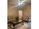 Comfortable living room with ample seating and a ceiling fan at 103 Live Oak Ct, Dallas, GA 30157