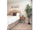 Main bedroom with plush bed and neutral decor at 1334 Rogers Landing Rd, Lithonia, GA 30058