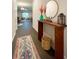 Bright entryway with console table and rug at 1334 Rogers Landing Rd, Lithonia, GA 30058