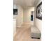 Upper hallway with bench and access to bedrooms at 1334 Rogers Landing Rd, Lithonia, GA 30058
