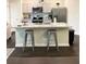 Kitchen island with granite countertop and seating at 1334 Rogers Landing Rd, Lithonia, GA 30058