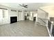 Open floorplan living room with kitchen and fireplace at 208 Spike Trl, Smyrna, GA 30080