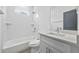 Clean bathroom with subway tile, white vanity, and bathtub at 550 Paines Nw Ave, Atlanta, GA 30318