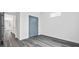 Spacious bedroom with hardwood floors and double doors at 550 Paines Nw Ave, Atlanta, GA 30318