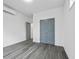 Bright bedroom with grey doors and wood-look floors at 550 Paines Nw Ave, Atlanta, GA 30318