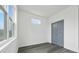 Simple bedroom with hardwood floors and large window for natural light at 550 Paines Nw Ave, Atlanta, GA 30318