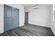 Spacious bedroom featuring grey doors and vinyl flooring at 550 Paines Nw Ave, Atlanta, GA 30318