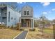 Modern two-story home with gray siding and a small porch at 550 Paines Nw Ave, Atlanta, GA 30318