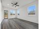 Bright living room with hardwood floors, ceiling fan, and access to deck at 550 Paines Nw Ave, Atlanta, GA 30318