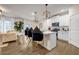 Modern kitchen with white cabinets, quartz countertops, and an island at 1087 Shadow Glen Dr, Fairburn, GA 30213