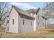 House exterior with white siding and metal roof at 119 E Johnson E St, Temple, GA 30179