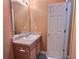 Small half bathroom with a sink and toilet at 1734 Spring Hill Cv, Lithonia, GA 30058