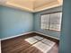 Bright bedroom with wood flooring and window at 1734 Spring Hill Cv, Lithonia, GA 30058